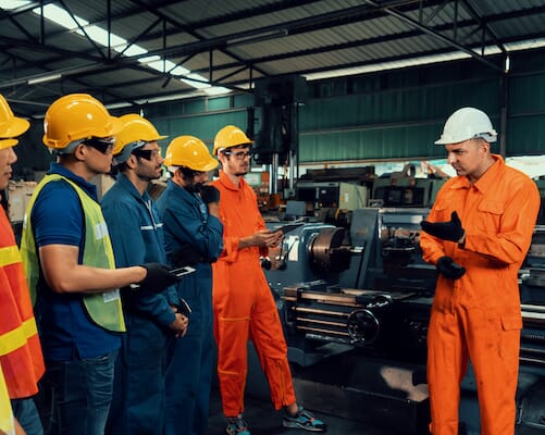 workers having a quick meeting