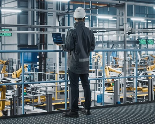 engineer overseeing manufacturing