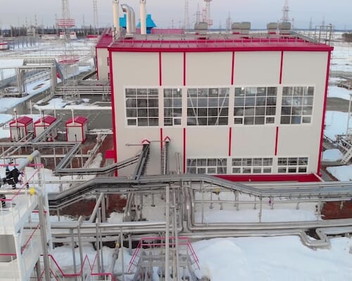 aerial shot of a factory in winter