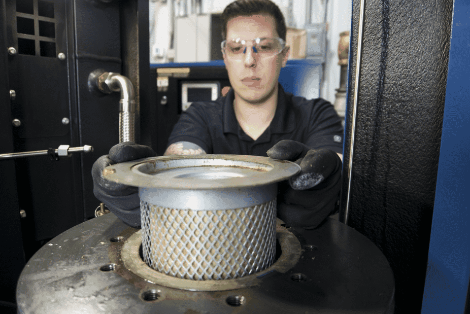 An air-oil separator removes oil mist from the air discharged from an oil-flooded screw compressor by combining the swirling action in the tank with the filtration action of the element. 