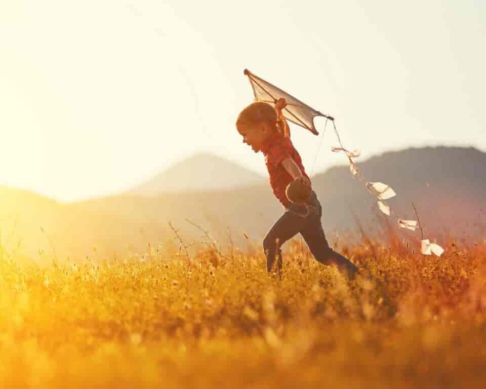 a child launching a kite